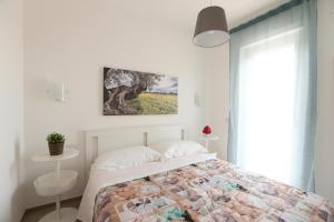 Postel nebo postele na pokoji v ubytování Casa cielo&mare