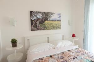 Postel nebo postele na pokoji v ubytování Casa cielo&mare