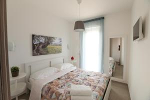 Postel nebo postele na pokoji v ubytování Casa cielo&mare