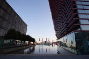 a view of a courtyard between two buildings at Best Western Plus Net Tower Hotel Padova in Padova