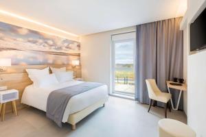 Postel nebo postele na pokoji v ubytování Best Western le Sémaphore + 37 fotografií