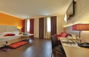 TV a/nebo společenská místnost v ubytování Best Western Plus Soave Hotel