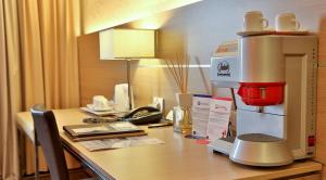 Kuchyň nebo kuchyňský kout v ubytování Best Western Plus Soave Hotel