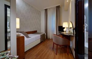 Posteľ alebo postele v izbe v ubytovaní Best Western Hotel City