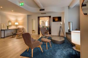 TV a/nebo společenská místnost v ubytování Best Western Plus CHC Florence