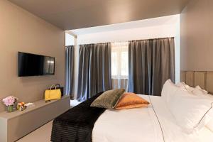 Krevet ili kreveti u jedinici u okviru objekta Albavilla Hotel & Co