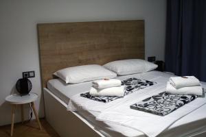 Postel nebo postele na pokoji v ubytování Apartments Agape