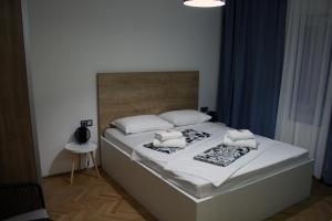Postel nebo postele na pokoji v ubytování Apartments Agape