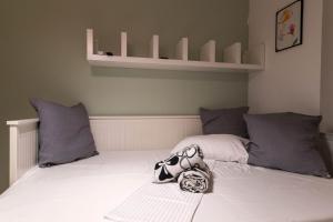 Postel nebo postele na pokoji v ubytování Apartments Agape