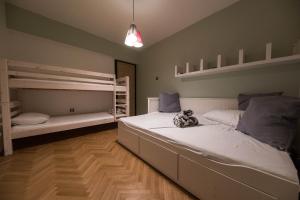 Postel nebo postele na pokoji v ubytování Apartments Agape + 37 fotografií