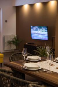 TV a/nebo společenská místnost v ubytování Apartments Agape