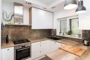 Kuchyň nebo kuchyňský kout v ubytování Apartments Agape