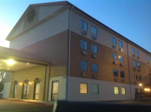 a large building with a building at Grand View Inn & Suites in Branson