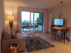 Телевизор и/или развлекательный центр в Iancu Charme Apartments