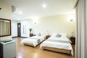 Voodi või voodid majutusasutuse My Lan Hanoi Hotel toas