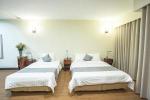 Voodi või voodid majutusasutuse My Lan Hanoi Hotel toas