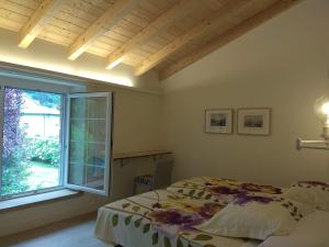 Postel nebo postele na pokoji v ubytování La Bicicleta Casa Rural