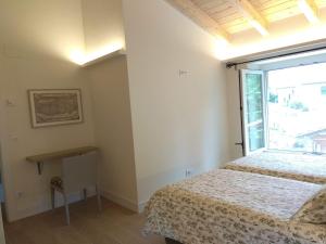 Postel nebo postele na pokoji v ubytování La Bicicleta Casa Rural