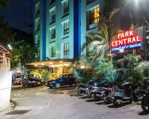 a row of motorcycles parked in front of a hotel at Hotel Park Central Comfort- E- Suites in Pune