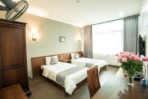 Voodi või voodid majutusasutuse My Lan Hanoi Hotel toas