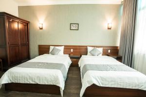 Voodi või voodid majutusasutuse My Lan Hanoi Hotel toas