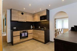 Kuchyňa alebo kuchynka v ubytovaní St. Florian Appartements