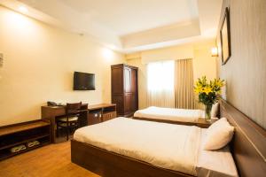 Voodi või voodid majutusasutuse My Lan Hanoi Hotel toas