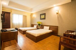 Voodi või voodid majutusasutuse My Lan Hanoi Hotel toas