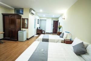 Voodi või voodid majutusasutuse My Lan Hanoi Hotel toas