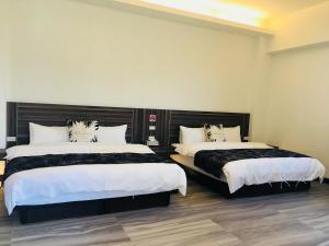 Cama o camas de una habitación en 旭語民宿 台東縣民宿1436號