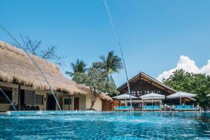 a view of the pool at the resort at Club Paradise Palawan in Coron