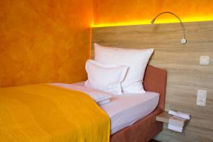 Postel nebo postele na pokoji v ubytování Hotel Gewürzmühle