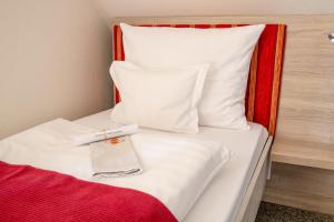 Postel nebo postele na pokoji v ubytování Hotel Gewürzmühle