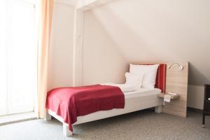 Postel nebo postele na pokoji v ubytování Hotel Gewürzmühle