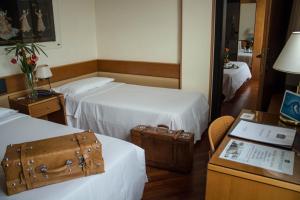 Postel nebo postele na pokoji v ubytování Best Western Hotel Dei Cavalieri