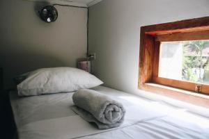 Ένα ή περισσότερα κρεβάτια σε δωμάτιο στο Mellow Hostel