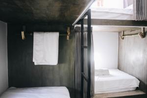 Ένα ή περισσότερα κρεβάτια σε δωμάτιο στο Mellow Hostel