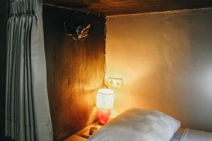 Ένα ή περισσότερα κρεβάτια σε δωμάτιο στο Mellow Hostel
