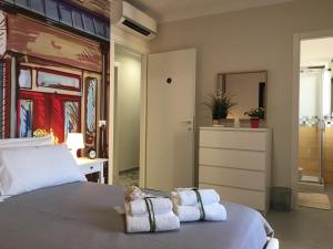 Posteľ alebo postele v izbe v ubytovaní B&B Paris