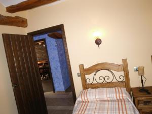 A bed or beds in a room at Apartamentos turísticos La Fuensanta