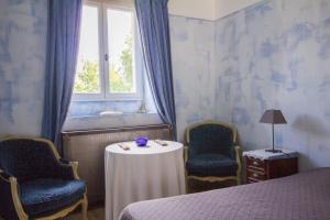 Ένα ή περισσότερα κρεβάτια σε δωμάτιο στο Le Relais de Fontenailles +54 φωτογραφίες