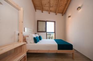Postel nebo postele na pokoji v ubytování ecoGrusApartments