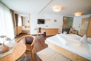 TV a/nebo společenská místnost v ubytování Hotel Pra Tlusel
