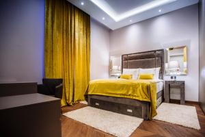 Posteľ alebo postele v izbe v ubytovaní Premium Apartments Villa Herkules