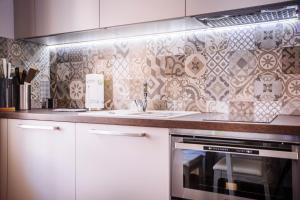Kuchyňa alebo kuchynka v ubytovaní Premium Apartments Villa Herkules