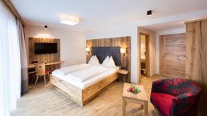Postel nebo postele na pokoji v ubytování Hotel Sendlhof