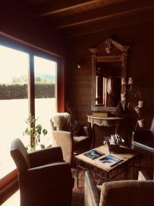 Posezení v ubytování Le Chalet d'Etienne