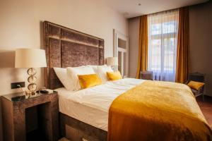 Posteľ alebo postele v izbe v ubytovaní Premium Apartments Villa Herkules