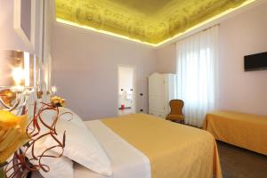 TV a/nebo společenská místnost v ubytování Hotel Ferrucci