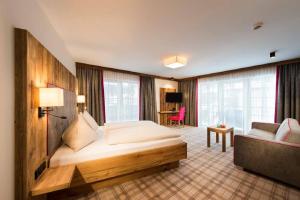 Postel nebo postele na pokoji v ubytování Hotel Sendlhof